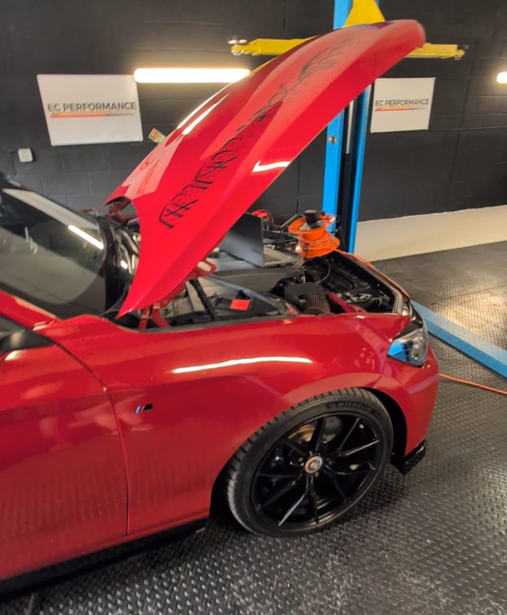 BMW on the dyno with bonnet up at EC Performance